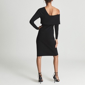 Model wearing Reiss Ella Asymmetric Bodycon Dress in black, knee-length, long sleeve, one-shoulder style, styled with strappy heels