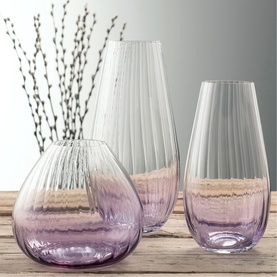 Galway Crystal Erne Vase set in purple amethyst glass, ribbed and plain finishes, three sizes shown styled with dried willow branches