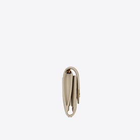 Saint Laurent Monogram Matelass&eacute; Leather Compact Tri-Fold Wallet in white grain de poudre leather, gold-tone hardware, snap closure, top view