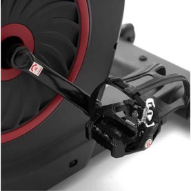Echelon EX5S Connect Bike in black, close-up of pedal and crank arm with red flywheel detail visible in background