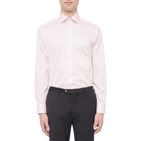 Model wearing Eton Slim Double Twill Shirt in pink, single cuff regular fit, styled with dark grey trousers