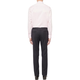 Model wearing Eton Slim Double Twill Shirt in pink, single cuff regular fit, styled with dark charcoal tailored trousers, rear view