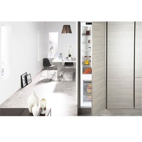 Whirlpool 70-30 Integrated Fridge Freezer shown open in a modern kitchen setting, revealing interior shelving and storage compartments