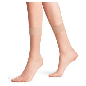Model wearing Falke Shelina Anklet Socks in Brazil brown, ultra-sheer ankle-length with a soft sensitive cuff band