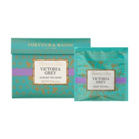 Fortnum & Mason Victoria Grey Silky Tea Bags in teal and gold box, shown with individual foil-wrapped tea bag