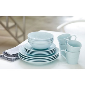 Gordon Ramsay Maze Blue 16 Piece Dinner Set featuring plates, bowls and mugs in pale blue, styled with a grey linen napkin