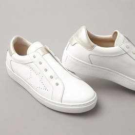 Mint Velvet Leather Trainers in white with slip-on style, perforated star detail, metallic heel tab and white sole