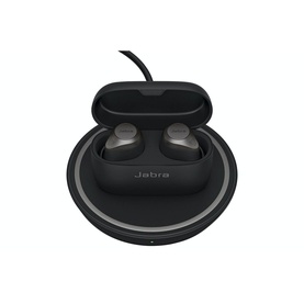 Jabra Elite 85t True Wireless Earbuds in black with titanium accents, shown in open charging case on wireless charging pad