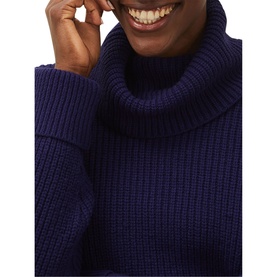 Model wearing Phase Eight Karine Chunky Roll Neck Sweater in blue, featuring ribbed knit texture and oversized roll neck collar