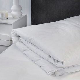 Karla Bree Microfill Supersoft 13.5 Tog Duvet in white, folded on a bed showing quilted stitching detail