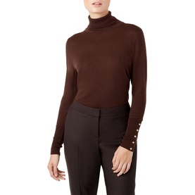 Model wearing Hobbs Lara Roll Neck in brown, fitted knit with gold button cuff detail, styled with dark tailored trousers