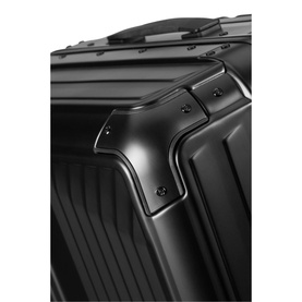 Samsonite Lite Box Alu 69 Spinner in black, close-up of top corner showing aluminium frame detail and TSA lock mechanism