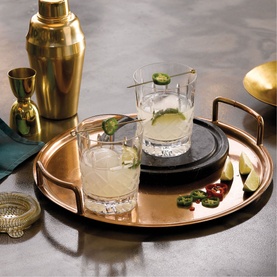 Waterford Lismore 12oz Double Old Fashioned Set of Two clear glasses with cocktails on a copper tray, with gold cocktail shaker behind