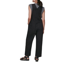 Model wearing Whistles Leni Dungarees in black, styled with a grey T-shirt. Back view, paired with black strappy sandals