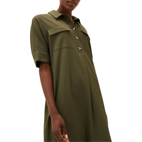Model wearing Phase Eight Lucina Midi Dress in green, short sleeve collared style with half button placket and patch pockets