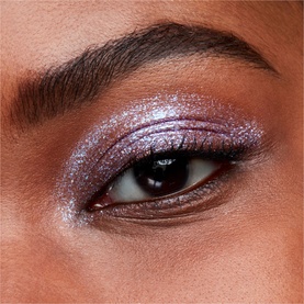 MAC Dazzleshadow Liquid in Diamond Crumbles eye shadow worn on lid, showing shimmering lilac-purple metallic finish