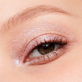 MAC Dazzleshadow Liquid in Diamond Crumbles eye shadow worn on lid, showing shimmering iridescent pink glitter finish