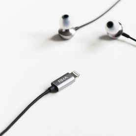 RHA MA650i Lightning Headphones with Microphone in silver and black, showing Lightning connector cable detail on white background