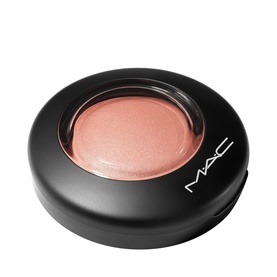 MAC Mineralize Blush in Sweet Enough, peachy-pink shimmer powder in a round black compact with mirror lid