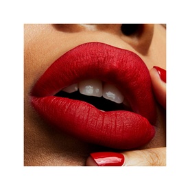 MAC Retro Matte Liquid Lipcolour in Feels So Grand, a deep red matte shade, shown on model's lips with matching red nail