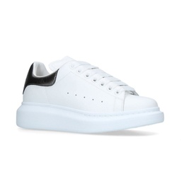 Alexander McQueen Oversized Runway Trainers in white leather with black patent heel tab and chunky white sole