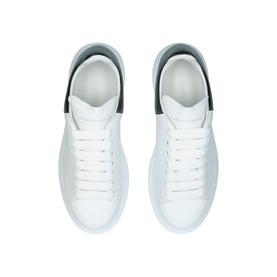 Alexander McQueen Oversized Runway Trainers in white leather, grey heel tab, white chunky sole, top-down view
