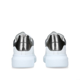Alexander McQueen Oversized Runway Trainers in white with metallic silver heel counter, chunky white sole, heel view
