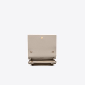 Saint Laurent Sunset Croc-Embossed Chain Wallet in white, open interior view showing compartments and gold snap closure