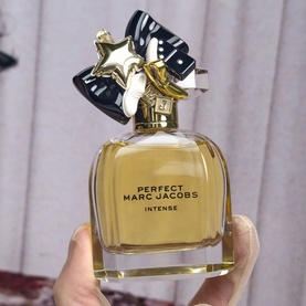 Marc Jacobs Perfect Intense Eau de Parfum 30ml, clear glass bottle with gold star and black ribbon cap detail