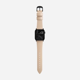Nomad Modern Slim Strap 40mm/38mm in cream leather with black hardware, fitted to an Apple Watch, shown on white background