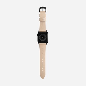 Nomad Modern Slim Strap 40mm/38mm in cream leather with black buckle hardware, fitted to a black smartwatch case