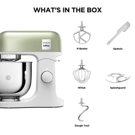 Kenwood kMix stand mixer in sage green with silver bowl, shown with included K-beater, spatula, whisk, splashguard and dough tool accessories