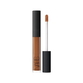 NARS Radiant Creamy Concealer in warm tan shade, shown with open doe-foot applicator wand beside black tube packaging