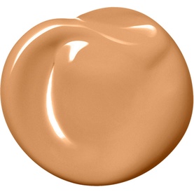 NARS Sheer Glow Foundation in Huahine, warm medium-tan beige shade shown as a glossy liquid swatch