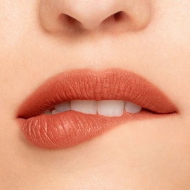 Close-up of lips wearing NARS Air Matte Lip Colour in Morocco, a warm terracotta nude matte shade, 7.5ml