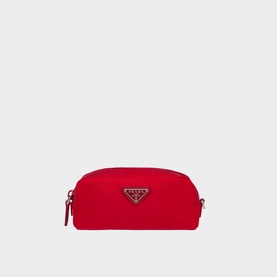 Prada Accessories Nylon Pouch in red with gold-tone triangle logo, zip closure and detachable leather wrist strap