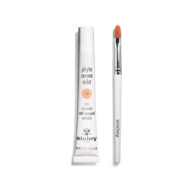 Sisley Phyto-Cernes Eclat Tinted Eye Concealer 15ml in beige-peach shade, shown with application brush, white packaging