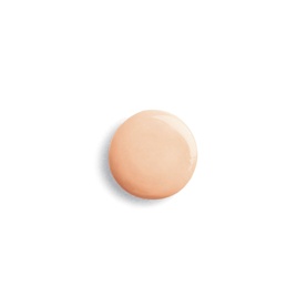 Sisley Phyto-Cernes Eclat Tinted Eye Concealer swatch in a peach-nude tone, showing creamy texture and natural finish