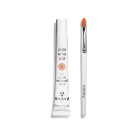 Sisley Phyto-Cernes Eclat Tinted Eye Concealer 15ml in peach-nude shade, shown with white applicator brush
