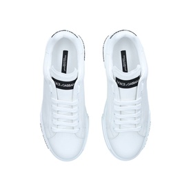 Dolce & Gabbana Portofino Clean Trainers in white leather, low-top with lace fastening, black heel tab branding, tonal rubber sole, top-down view