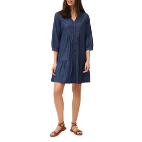 Model wearing Phase Eight Penele Swing Dress in blue denim, 3/4 sleeves, tiered skirt, button front, styled with tan sandals