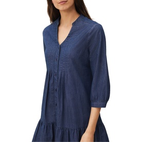 Model wearing Phase Eight Penele Swing Dress in blue, showing V-neckline, three-quarter sleeves, button placket and tiered skirt detail