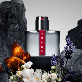 Prada Beauty Luna Rossa Carbon Eau de Toilette 50ml, grey glass bottle with red label, styled with lavender