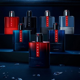 Prada Beauty Luna Rossa Carbon Eau de Toilette 150ml EDT, collection of five bottles in red, navy and grey on dark stepped display