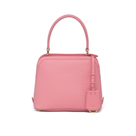 Prada Accessories Matin&eacute;e Saffiano Leather Micro Bag in pink with gold-tone hardware, top handle, and leather name tag charm