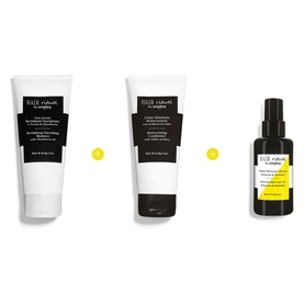 Sisley Revitalising Smoothing Shampoo with Macadamia Oil three-piece haircare set in white and yellow packaging