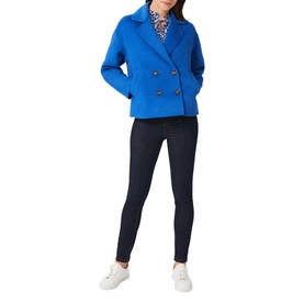 Model wearing Hobbs Rosanna Wool Blend Coat in blue, double-breasted, short length, styled with dark skinny jeans and white trainers