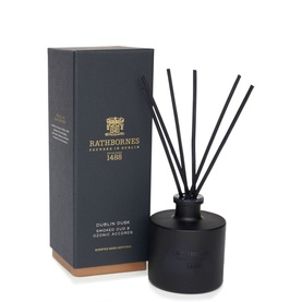 Rathbornes Dublin Dusk Reed Diffuser in matte black glass vessel with black reeds, shown with matching dark gift box
