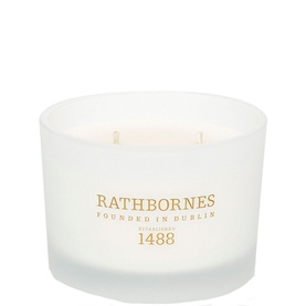 Rathbornes Dublin Tea Rose Classic Candle in frosted white glass with three wicks and gold brand lettering