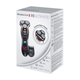 Remington R9 Ultimate Series Rotary Shaver in packaging, showing shaver with ComfortSpin heads and digital display, with trimmer attachment